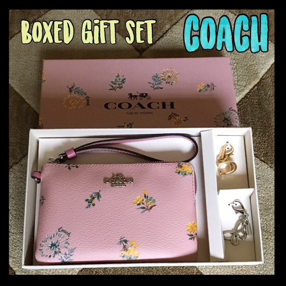 Coach Handbags - ❤️NEW MARKDOWN❤️ Coach floral wristlet and charm gift set 💙FINAL💙